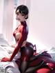 A woman in a red latex outfit sitting on a bed.