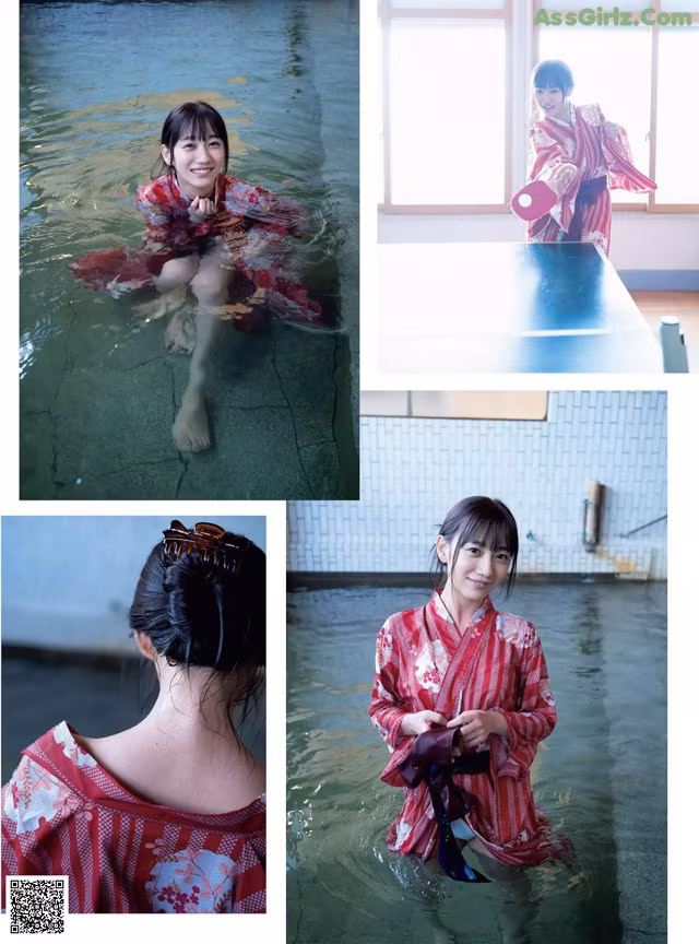 A woman in a red kimono is sitting in the water.